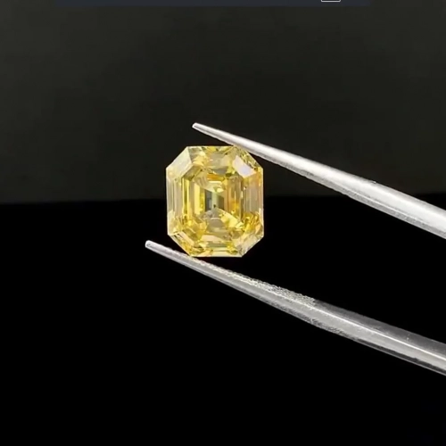 Бриллиант 5.18 карат желтый CVD искусственный изумрудной огранки Fancy intense yellow VS1 10,47х9,07х5,77 мм